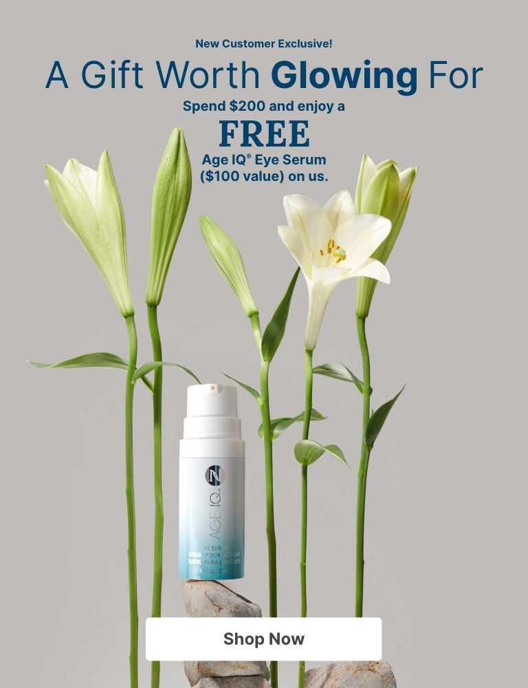 New Customer Exclusive: Spend $200 and enjoy a FREE Age IQ Eye Serum ($100 value). Featured is a Age IQ Eye Serum container next to plants.